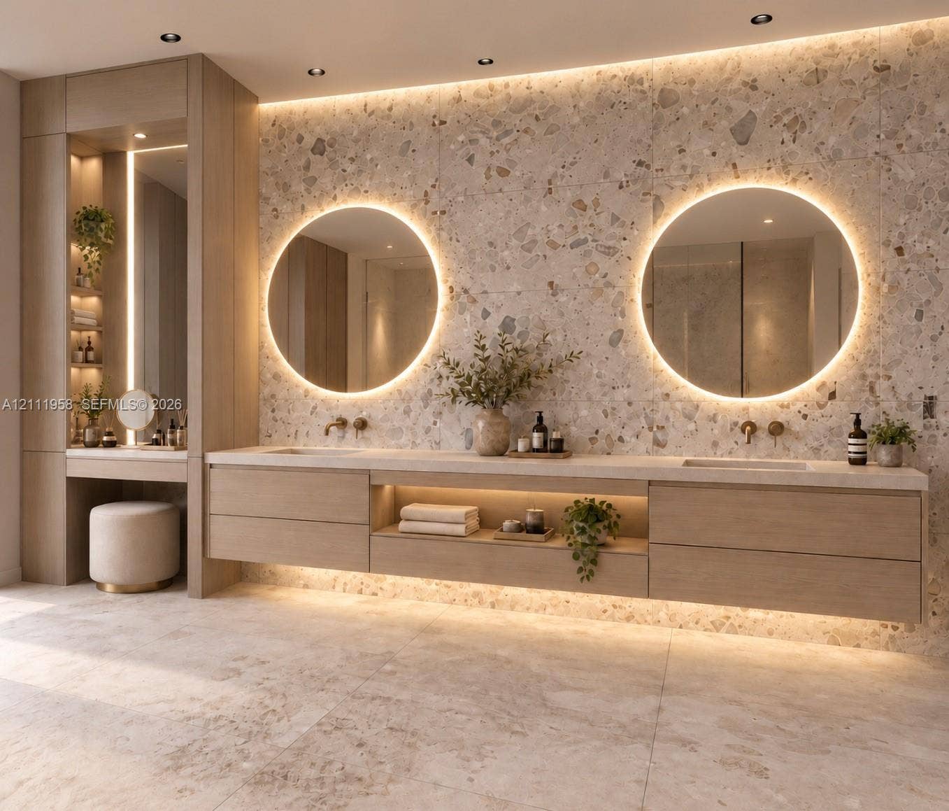 1117 NE 2nd Street, Fort Lauderdale, FL 33301 Custom floating vanity with wood-finish cabinetry, integrated open shelving, backlit circular mirrors, stone-composite wall cladding, and an integrated makeup station with vertical accent lighting