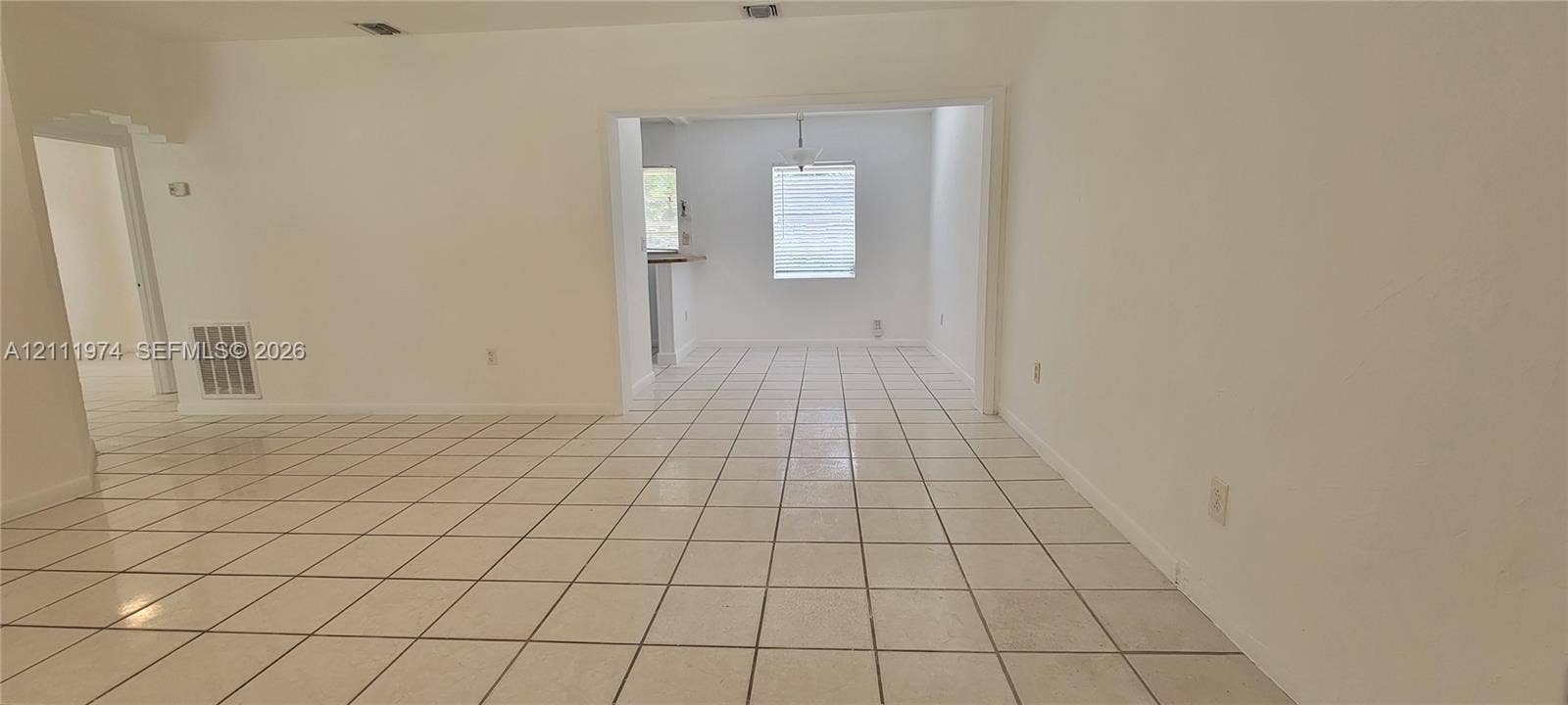 600 SW 44th Court, Miami, Miami, FL 33134 Neutral-toned ceramic tile flooring, crisp white interior paint, and recessed ceiling lighting