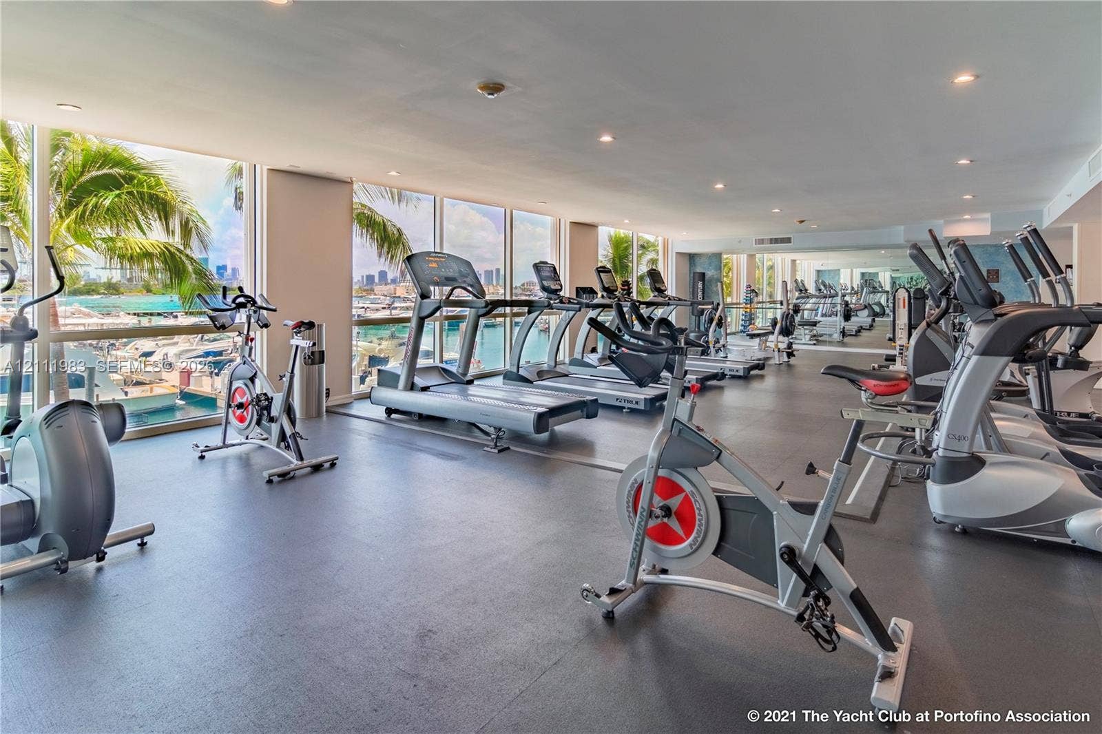 90 Alton Road, #TH-8, Miami Beach, FL 33139 Fitness center featuring floor-to-ceiling windows, rubberized flooring, and recessed ceiling lighting