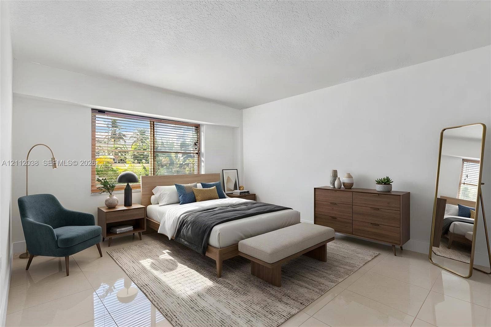Large-format tile flooring and a wide, multi-pane window featuring horizontal blinds