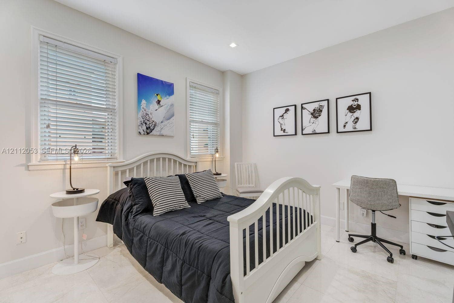 Neutral-toned interior featuring recessed lighting, polished tile flooring, and dual windows with horizontal blinds