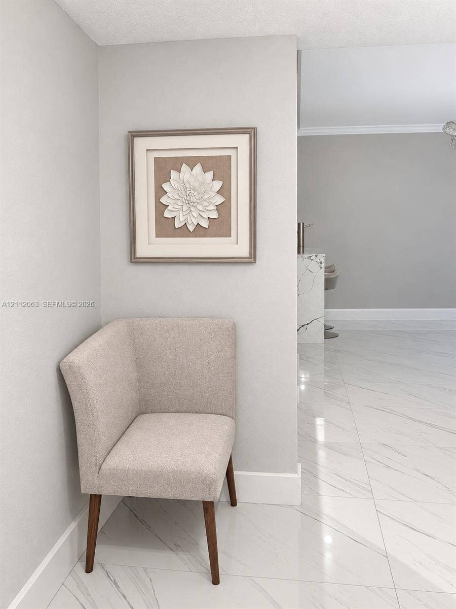 1360 S Ocean Boulevard, #2503, Pompano Beach, Pompano Beach, FL 33062 Large-format polished stone flooring with neutral veining throughout