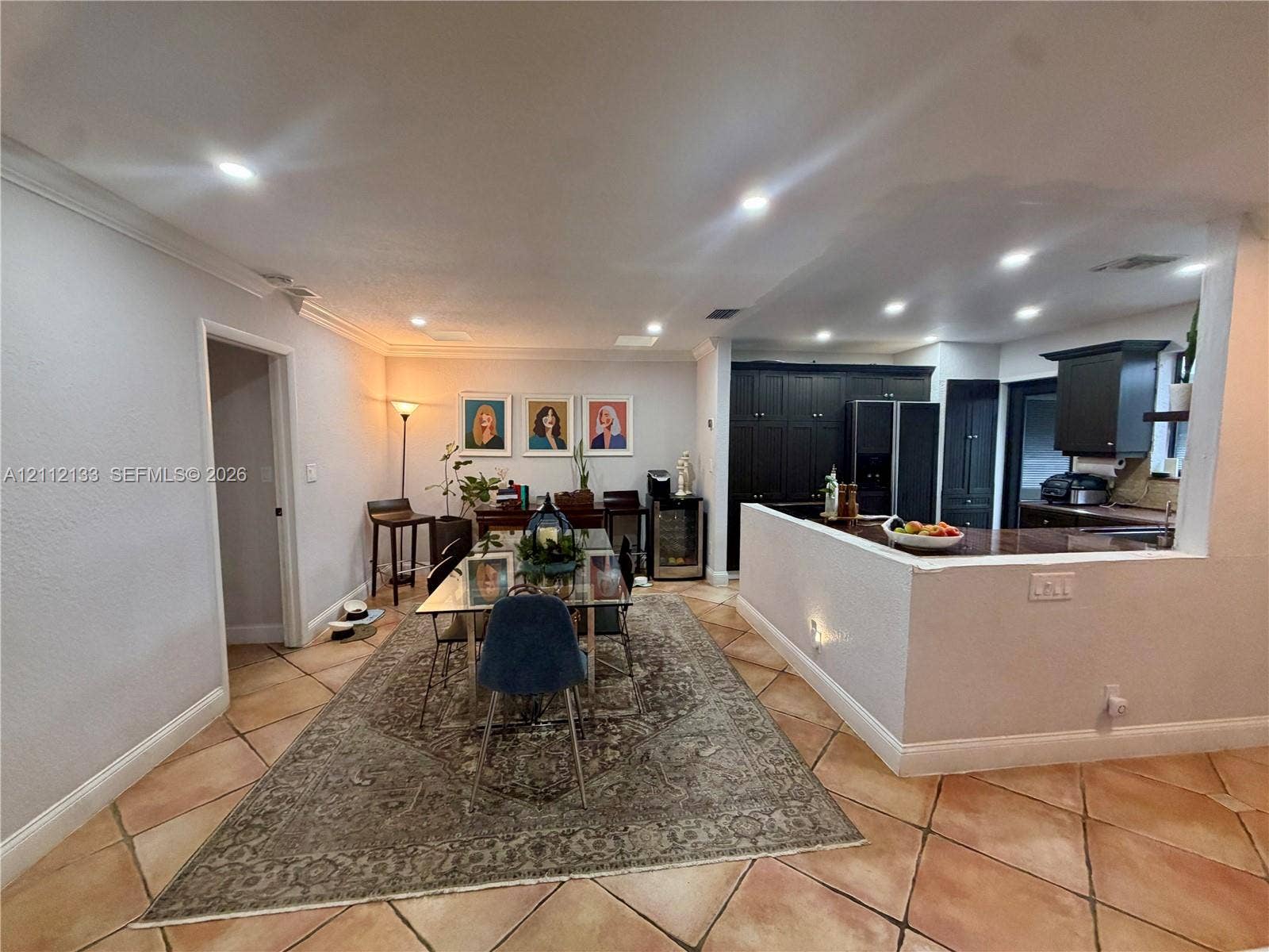 407 Bonnie Brae Way, #22, Hollywood, Hollywood, FL 33021 Ceramic tile flooring, recessed ceiling lighting, and dark-toned cabinetry with a peninsula counter