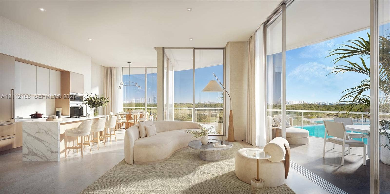 2411 Laguna Circle, #2906, Miami, FL 33181 Open-concept interior featuring floor-to-ceiling glass sliding doors, stone-finish kitchen island, recessed lighting, and balcony access