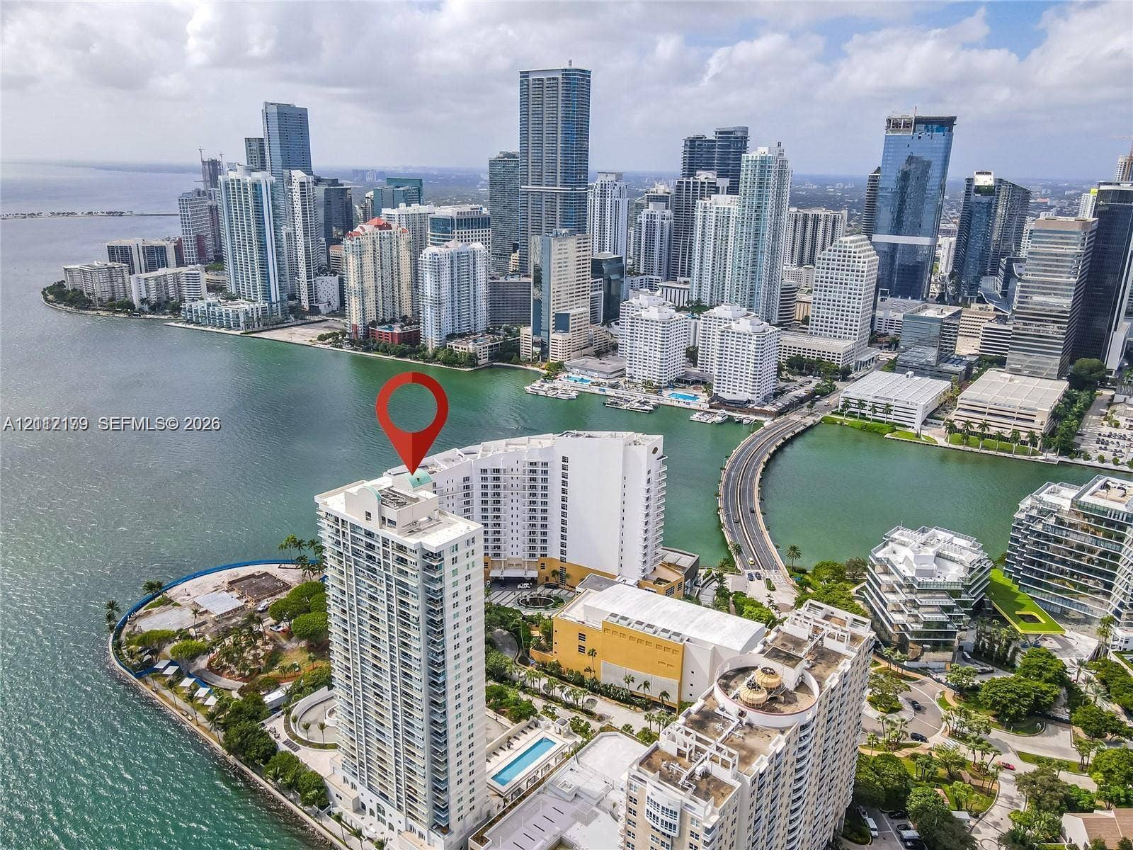 800 Claughton Island Drive, #1604, Miami, Miami, FL 33131 Aerial perspective of waterfront high-rise featuring a coastal location, immediate proximity to Biscayne Bay, and panoramic urban skyline exposure