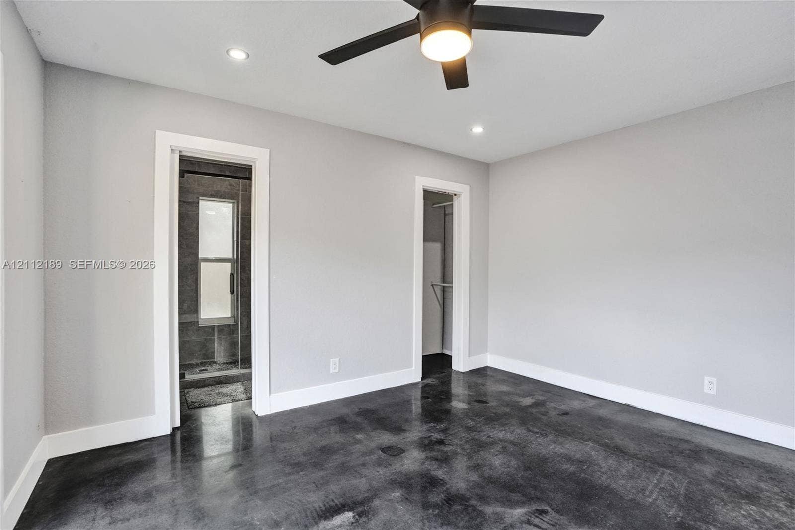 5161 SW 7th Court, #0, Margate, Margate, FL 33068 Polished concrete flooring, recessed lighting, and a modern ceiling fan with integrated lighting