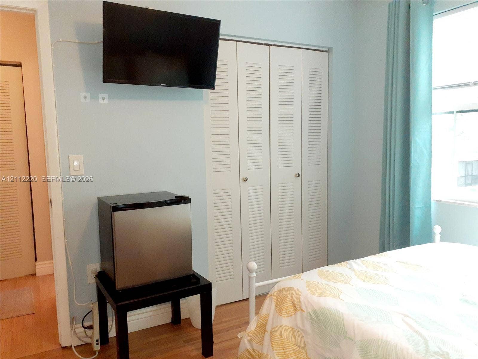 508 W Westree Lane, #508, Plantation, Plantation, FL 33324 Light-toned wood-finish flooring and louvered-style bi-fold closet doors