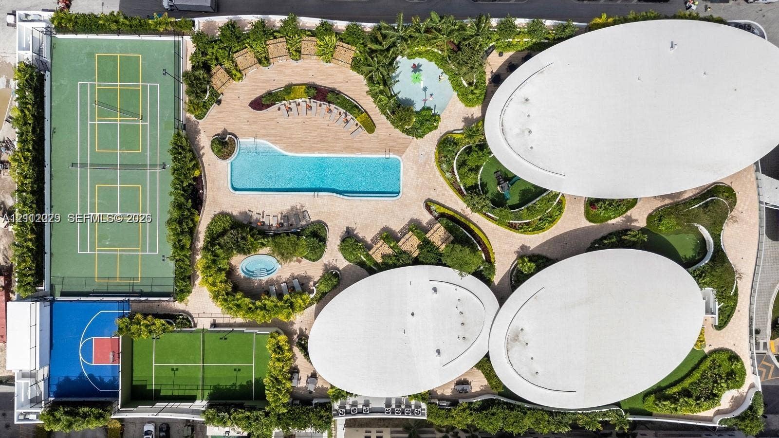 725 NE 24th Street, #706, Miami, Miami, FL 33137 Recreational grounds featuring a tennis court, basketball court, swimming pool, spa, and structured shade canopies