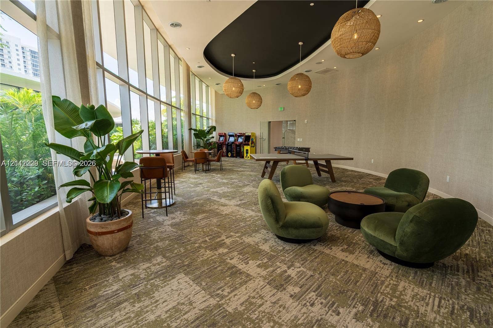725 NE 24th Street, #706, Miami, Miami, FL 33137 Floor-to-ceiling windows, recessed lighting, textured wall coverings, multi-level ceiling design, and woven pendant fixtures