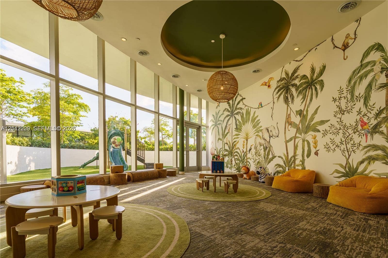 725 NE 24th Street, #706, Miami, Miami, FL 33137 Floor-to-ceiling windows, circular recessed ceiling detail, woven pendant lighting, wall-to-wall mural, and carpeting