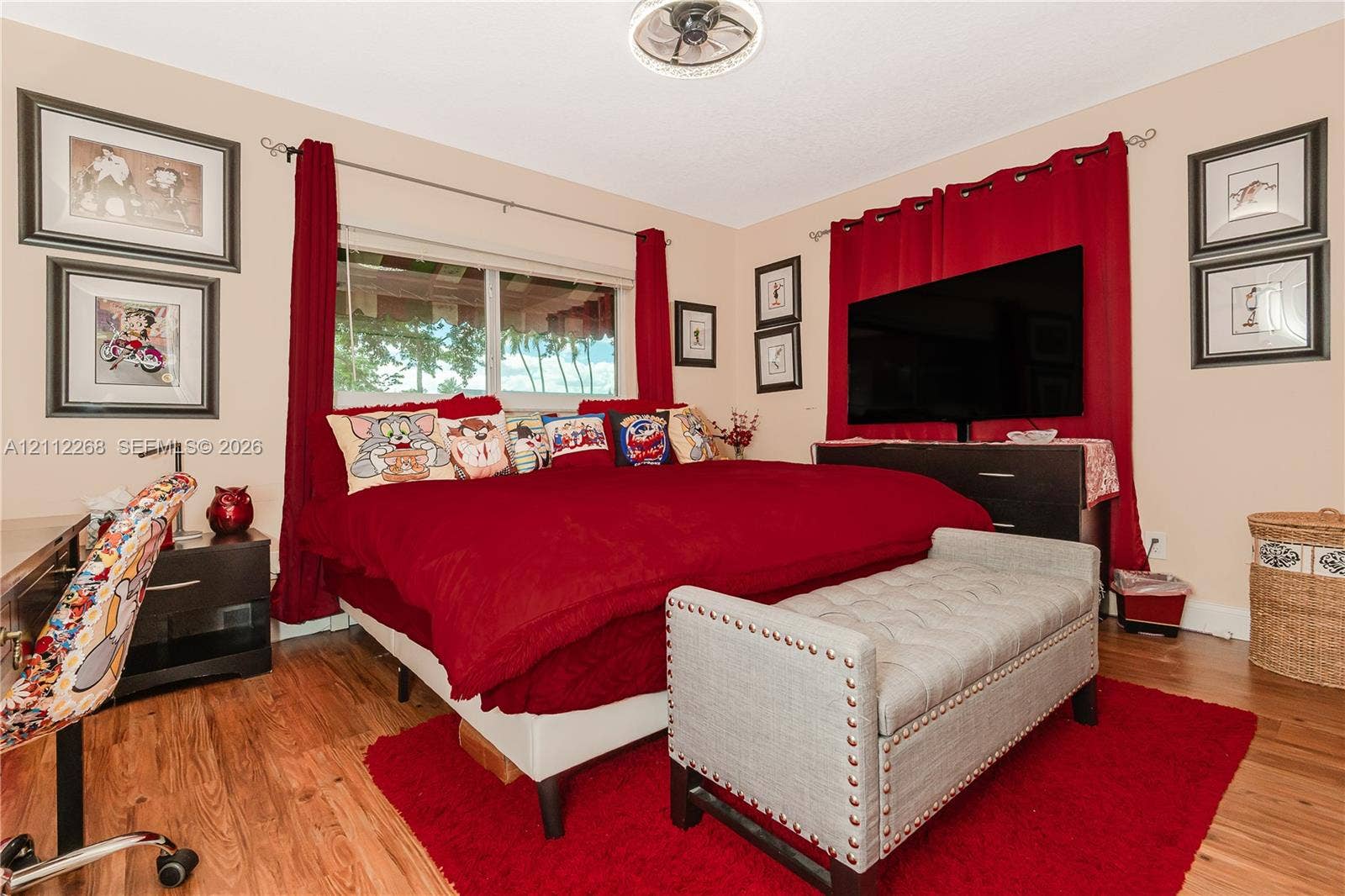 5941 SW 16th Court, Plantation, FL 33317 Wood-finish flooring, ceiling-mounted light fixture, and horizontal window