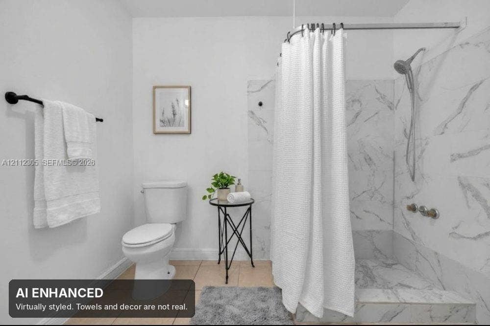 1008 N 18th Court, Hollywood, FL 33020 Virtually staged (AI). Furniture and decor are not real. The unaltered original is the previous photo.