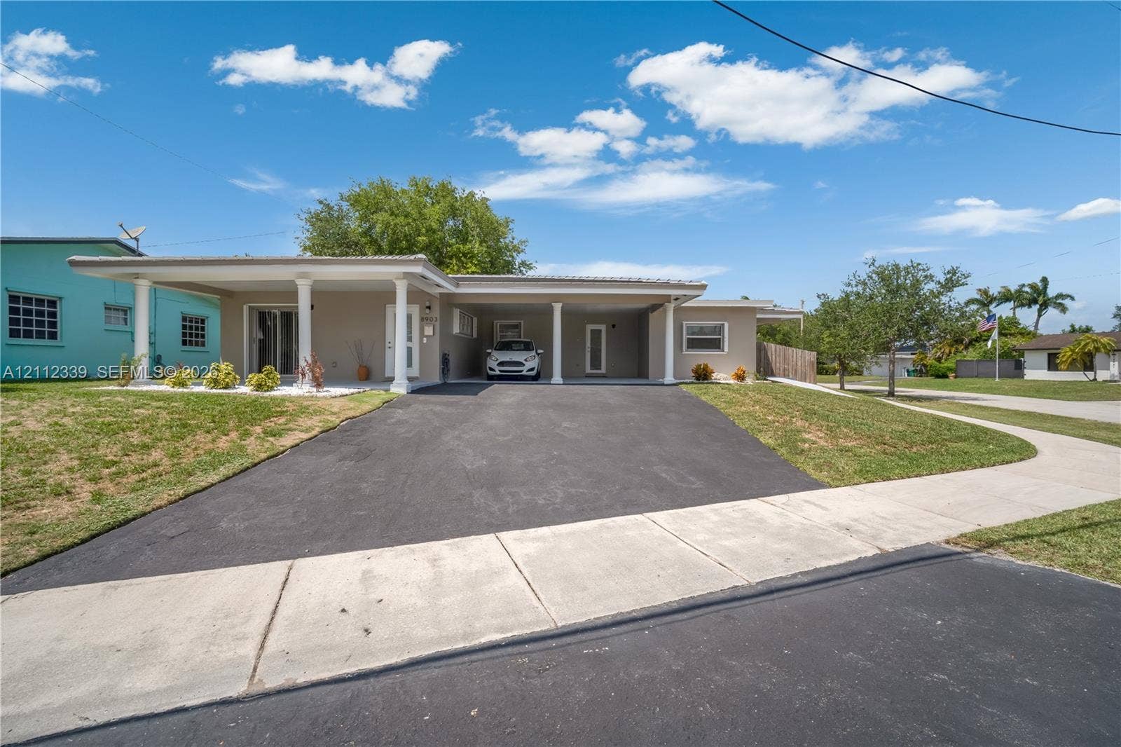 8901 SW 149th Terrace, #n/a, Palmetto Bay, Palmetto Bay, FL 33176 Fully renovated in 2025 * Single-story duplex featuring a private carport for 1 car (on the right side) , and a paved driveway