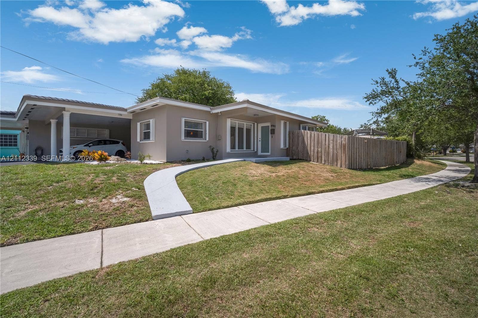 8901 SW 149th Terrace, #n/a, Palmetto Bay, Palmetto Bay, FL 33176 Single-story duplex featuring a concrete walkway, and wood privacy fencing for your private back yard