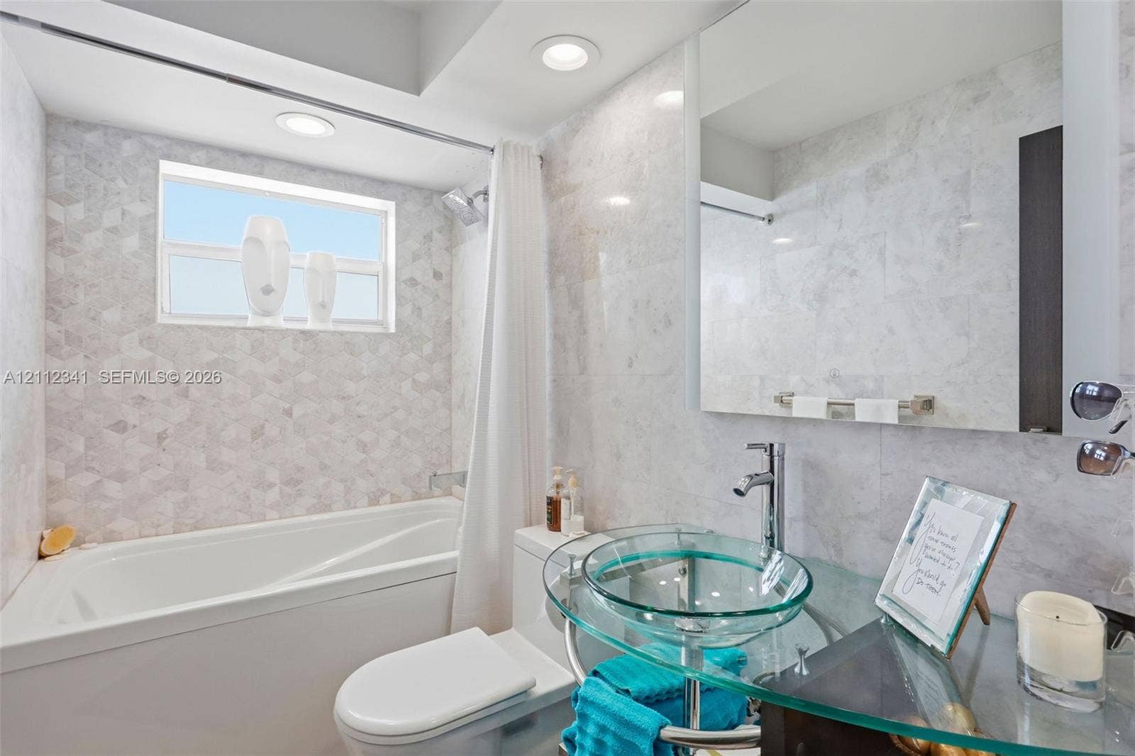 1617 SE 15th Street, #401, Fort Lauderdale, FL 33316 Bathroom featuring full-height decorative stone-patterned wall tile, glass vessel sink, chrome faucet, and recessed lighting