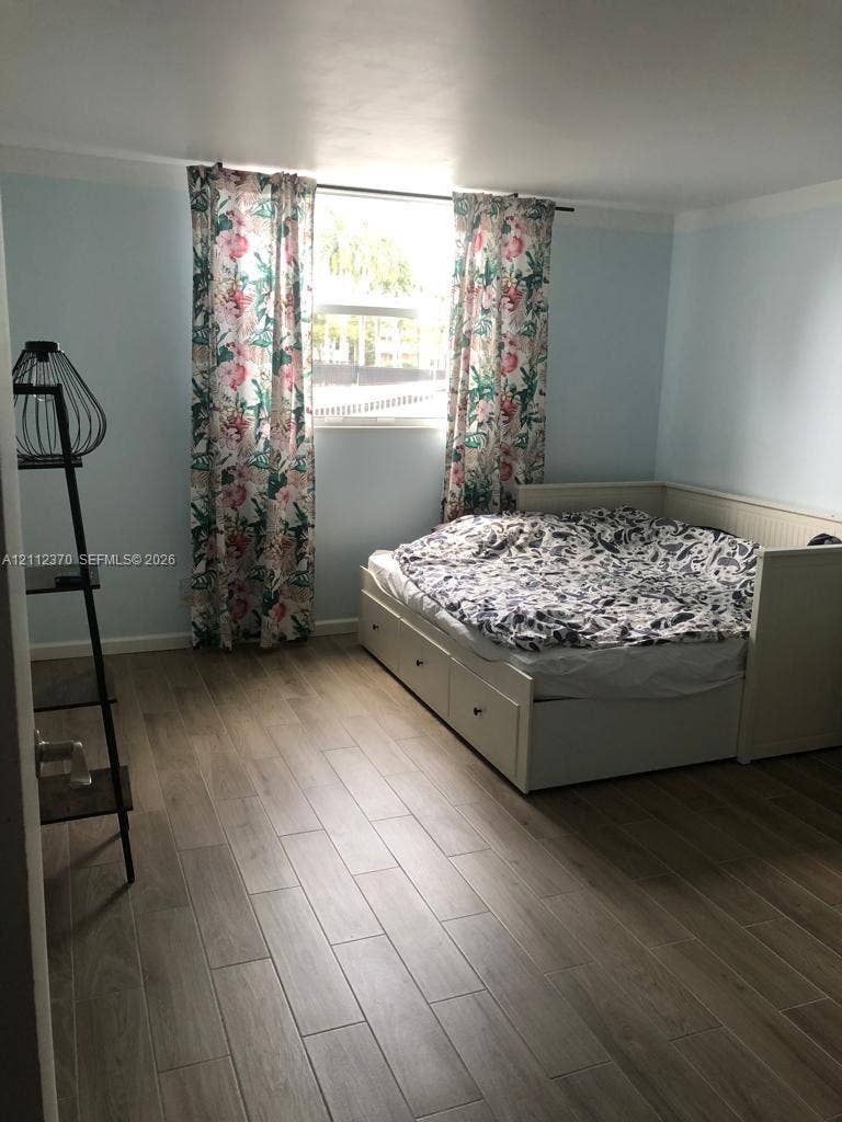 Wood-finish flooring and a single-pane window