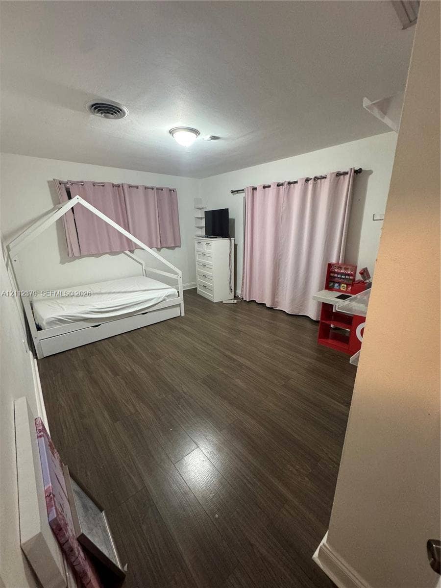 19600 NE 18th Place, Miami, FL 33179 Wood-finish flooring and flush-mount ceiling lighting