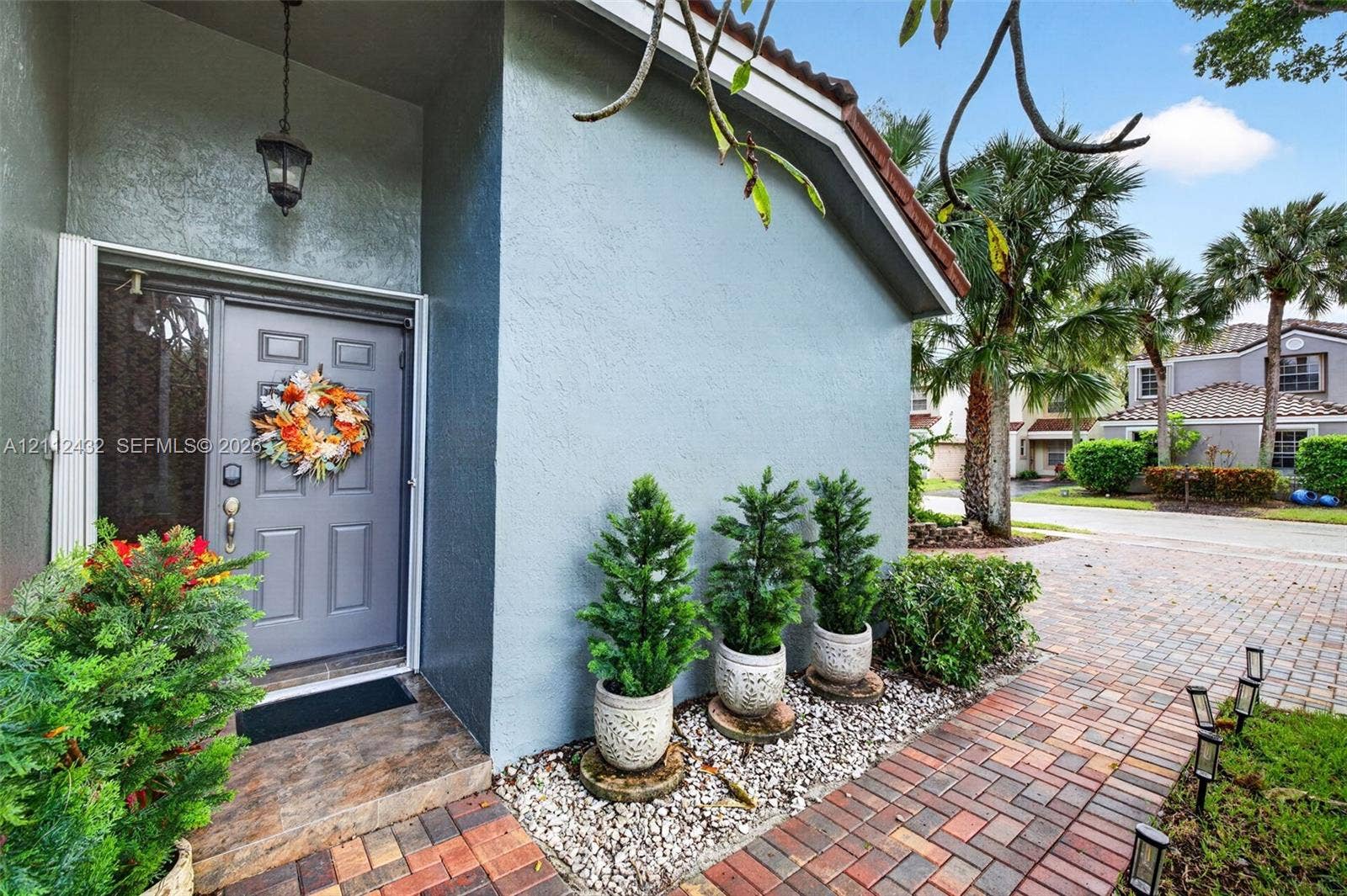 10545 NW 11th Court, Plantation, FL 33322 Entry featuring paver stone walkway