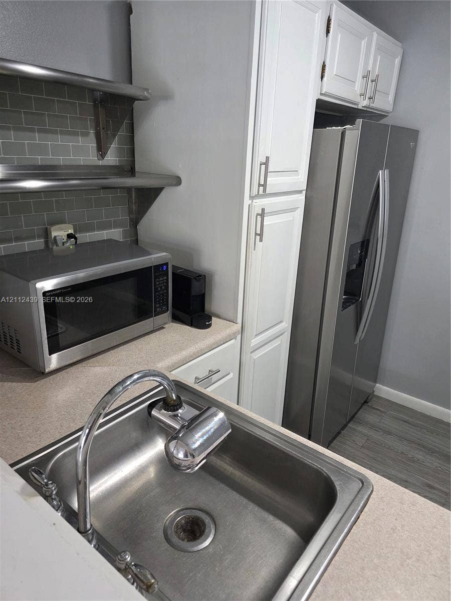 SS SHELVING, REF., RANGE, SINK, MICROWAVE