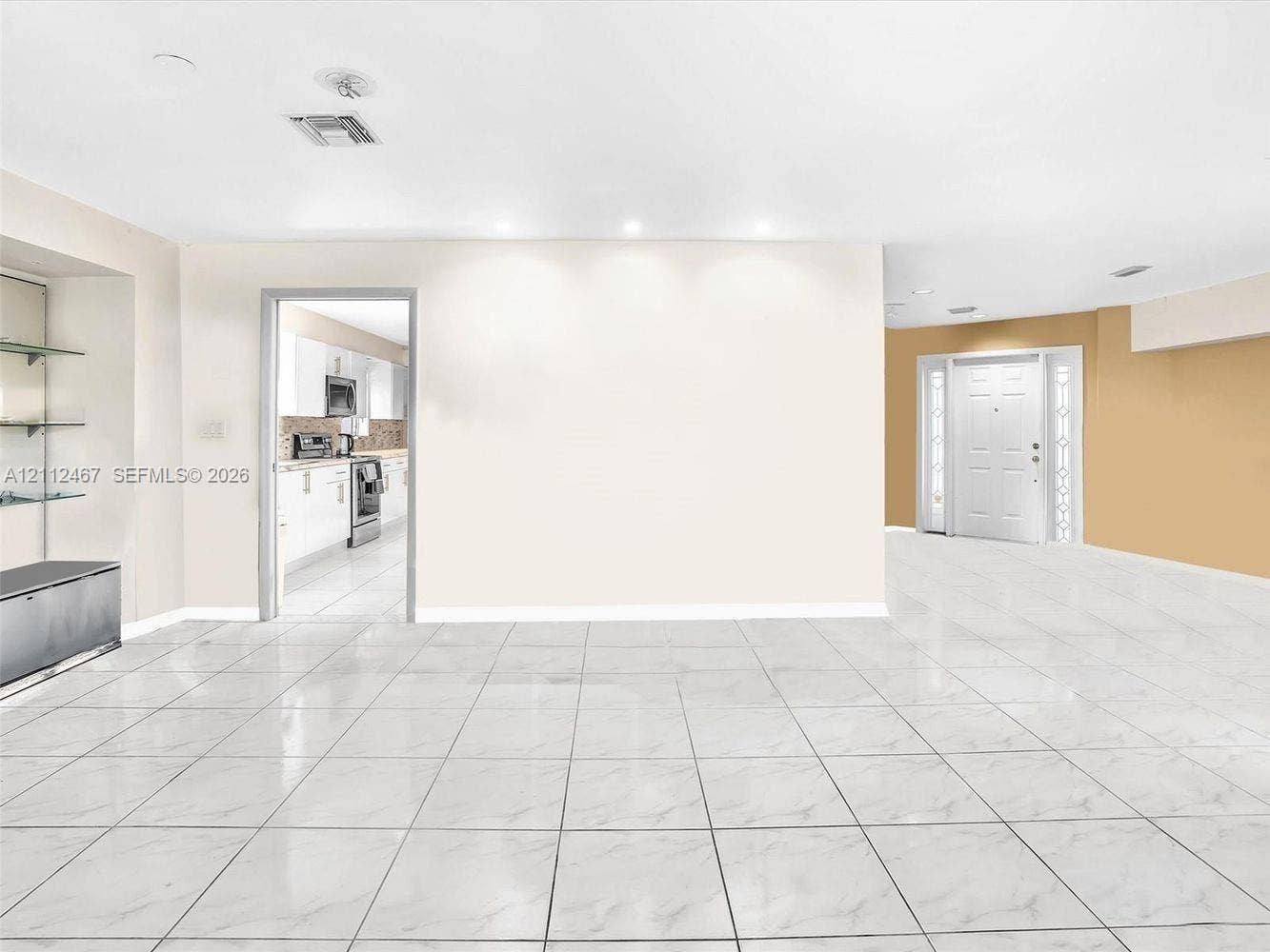 250 NE 212th Street, Miami, Miami, FL 33179 Large-format tile flooring, recessed ceiling lighting, built-in recessed display shelving, and an exterior entry door with glass sidelights