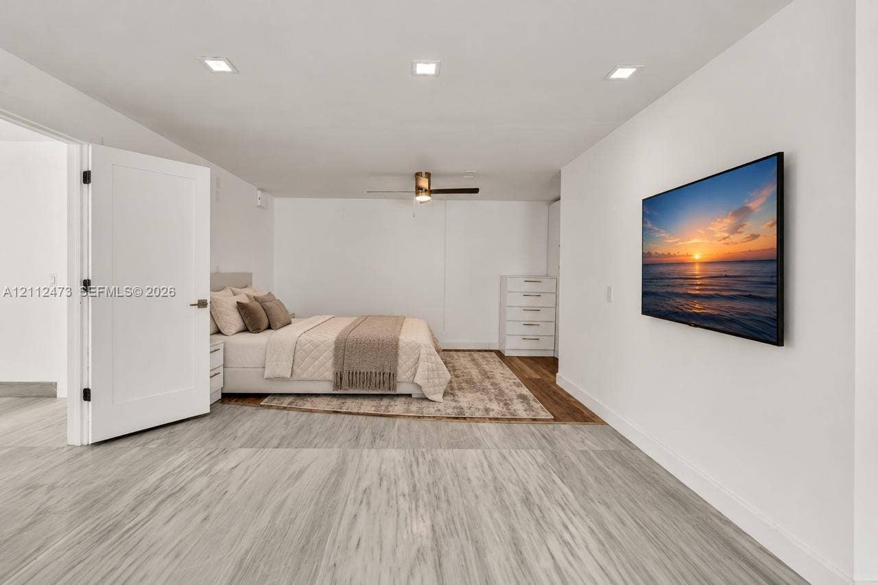 3340 SW 50th Street, Hollywood, Hollywood, FL 33312 Wood-finish flooring, recessed lighting, and a modern ceiling fan