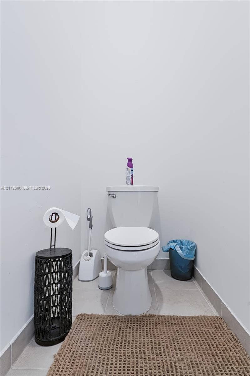 538 SW 19th Terrace, Fort Lauderdale, Fort Lauderdale, FL 33312 Standard-height white toilet with ceramic floor tiling