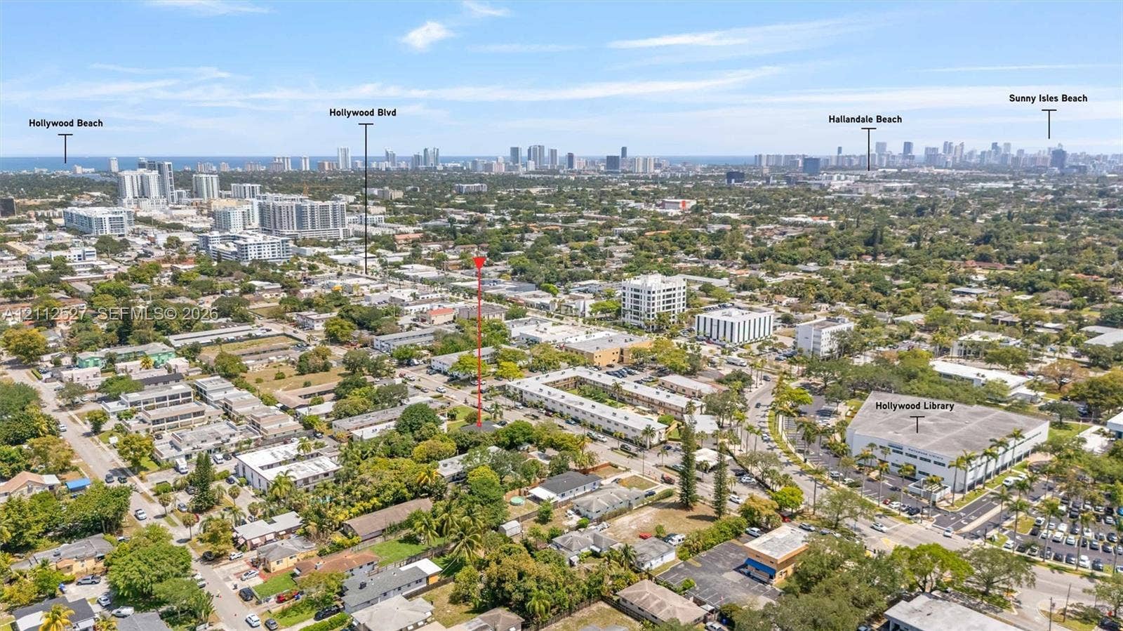 2517 Polk Street, Hollywood, Hollywood, FL 33020 Aerial perspective of the metropolitan region with visibility of the coastline and surrounding urban infrastructure