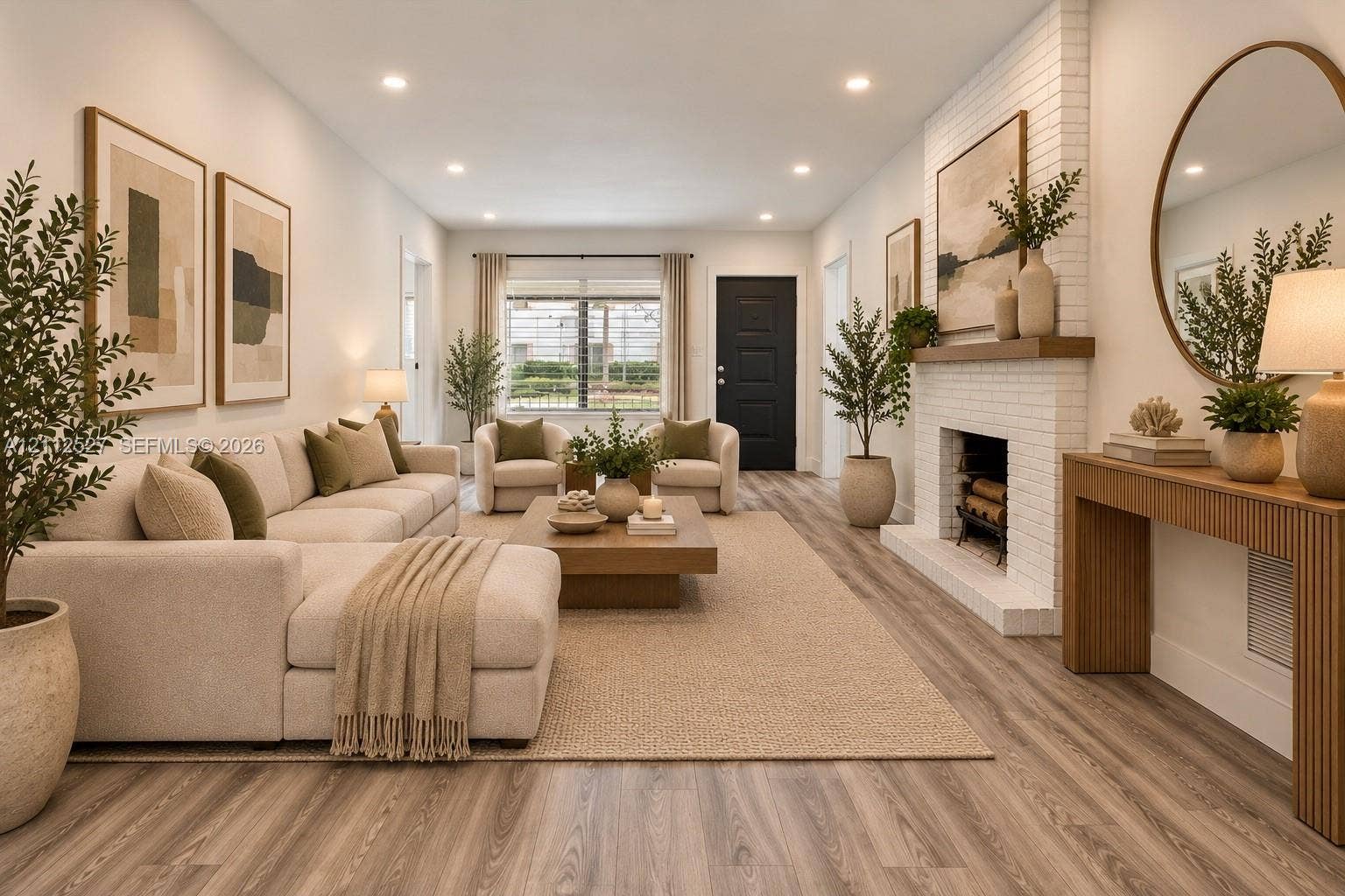 2517 Polk Street, Hollywood, Hollywood, FL 33020 Open-concept living space featuring wood-finish flooring, recessed lighting, and a white-painted brick fireplace with a wood mantel