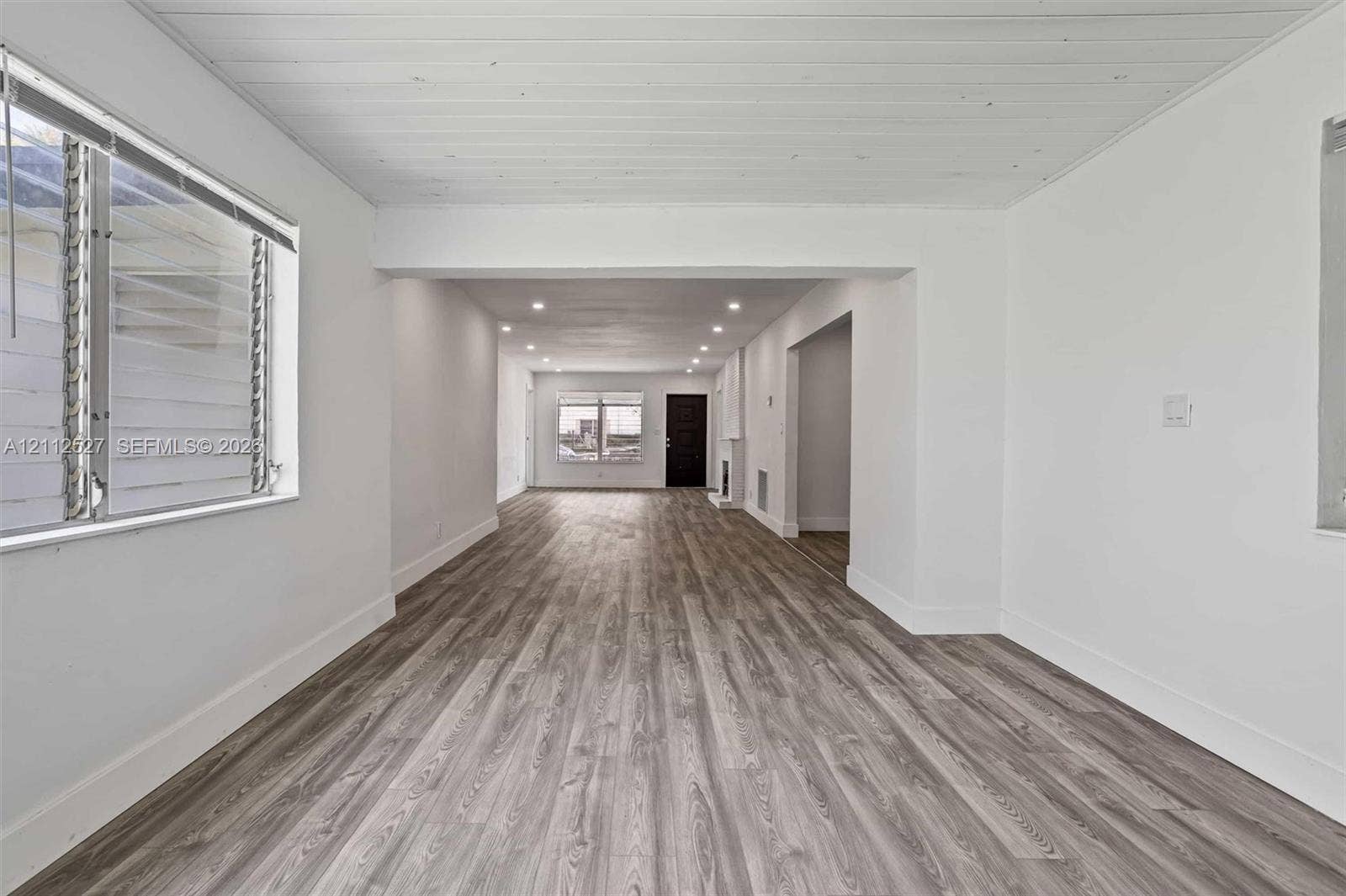 2517 Polk Street, Hollywood, Hollywood, FL 33020 Interior featuring wood-finish flooring, recessed lighting, and a plank-style ceiling