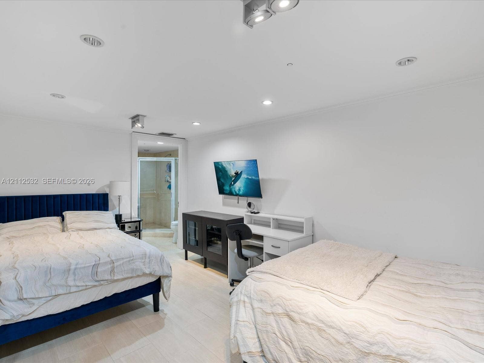 18911 Collins Avenue, #601, Sunny Isles Beach, FL 33160 Recessed ceiling lighting, light-toned flooring, and wall-mounted television bracket
