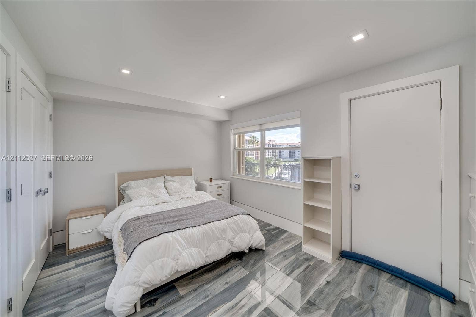 2871 N Ocean Boulevard, #R360, Boca Raton, FL 33431 Room featuring wood-finish flooring, recessed lighting, and a multi-pane window