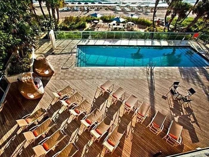 17315 Collins Avenue, #705, Sunny Isles Beach, FL 33160 Rectangular swimming pool with paved surround and glass panel railing