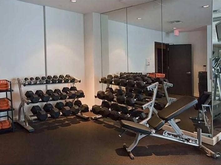 17315 Collins Avenue, #705, Sunny Isles Beach, FL 33160 Dedicated fitness space featuring mirrored walls and durable rubberized flooring