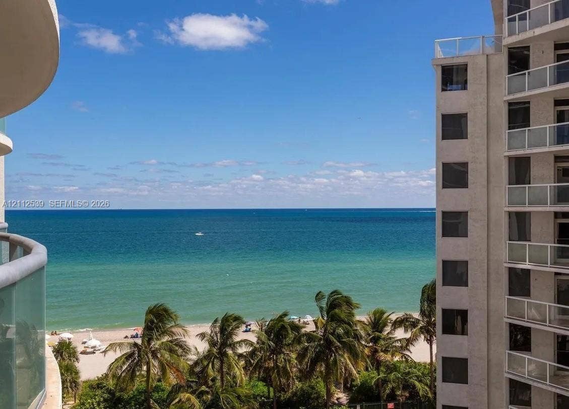 17315 Collins Avenue, #705, Sunny Isles Beach, FL 33160 Private balcony featuring glass railings and direct oceanfront exposure