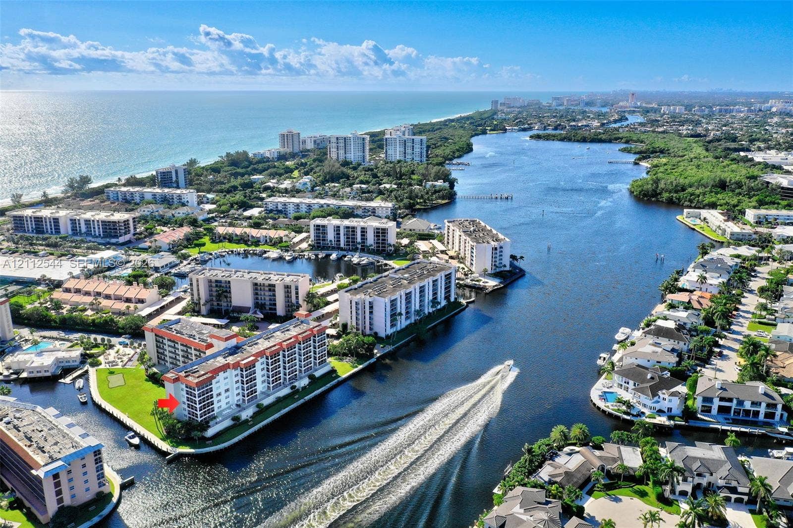 2871 N Ocean Boulevard, #R360, Boca Raton, Boca Raton, FL 33431 Aerial perspective of coastal multi-story residential building featuring waterfront positioning, expansive waterway exposure, and proximity to shoreline