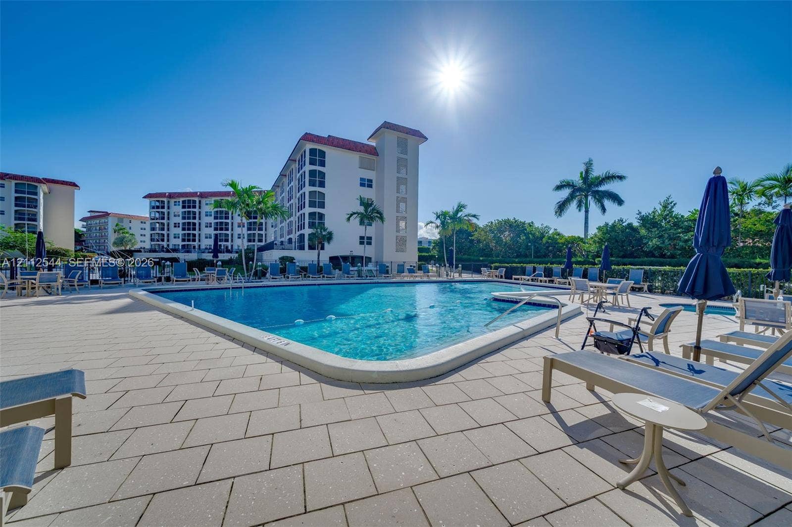 2871 N Ocean Boulevard, #R360, Boca Raton, Boca Raton, FL 33431 Swimming pool with paved surround and integrated hot tub