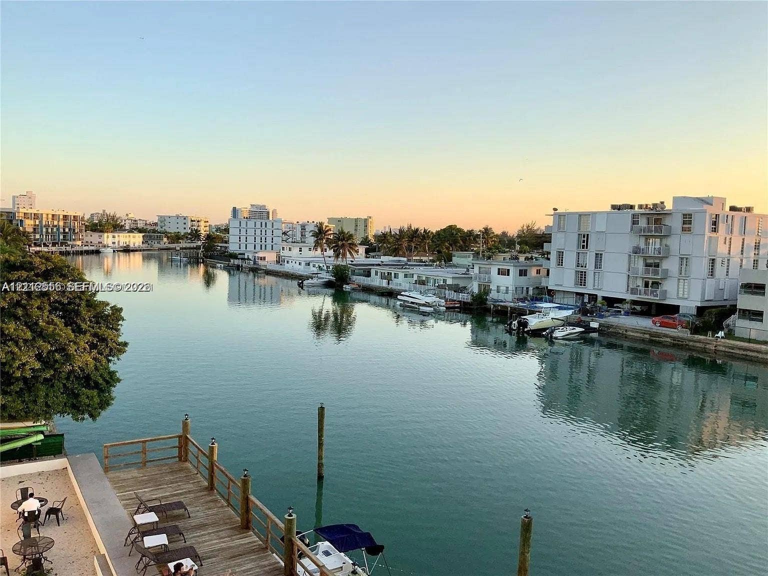 8400 Byron Avenue, #4E, Miami Beach, Miami Beach, FL 33141 Waterfront property featuring a wooden bulkhead dock and direct waterway access