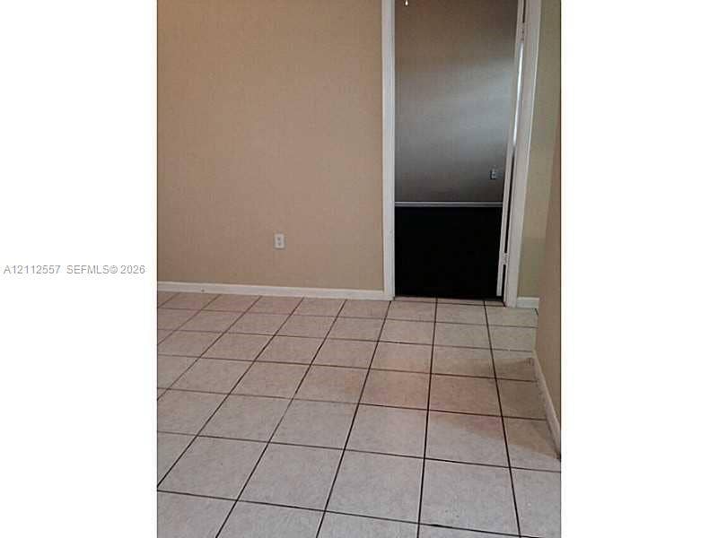 2121 NW 96th Terrace, #14J, Pembroke Pines, Pembroke Pines, FL 33024 Square tile flooring and neutral wall paint