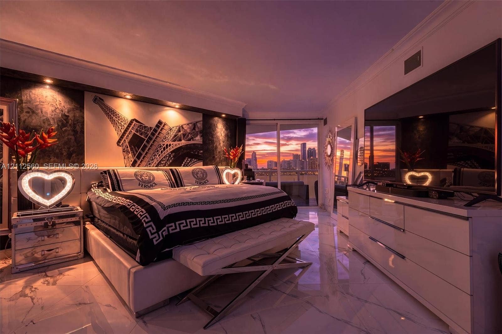 4000 Island Boulevard, #701, Aventura, FL 33160 Polished stone flooring, floor-to-ceiling glass sliding doors, and recessed ceiling lighting