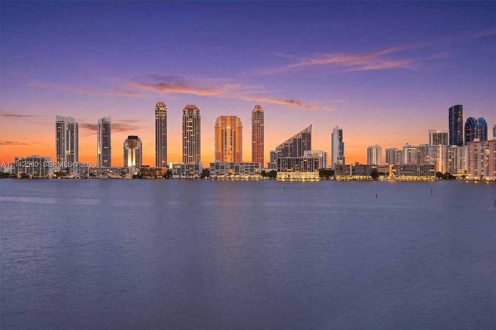 4000 Island Boulevard, #701, Aventura, FL 33160 Waterfront location featuring expansive skyline scenery at sunset