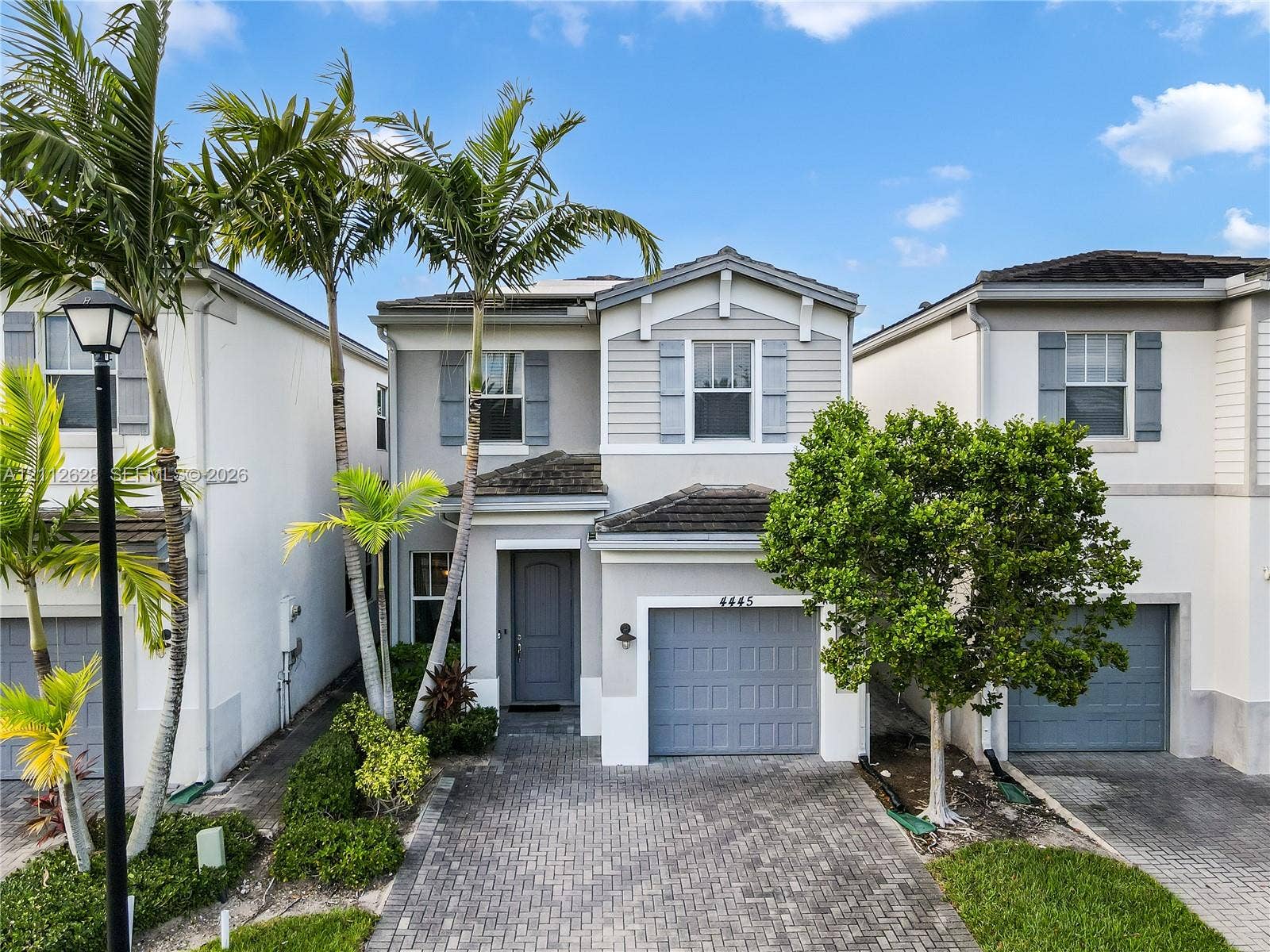 4445 NW 48th Terrace, Tamarac, Tamarac, FL 33319 Enjoy beautifully manicured landscaping maintained by the HOA, with ample guest parking and a community playground conveniently located just steps from your front door.