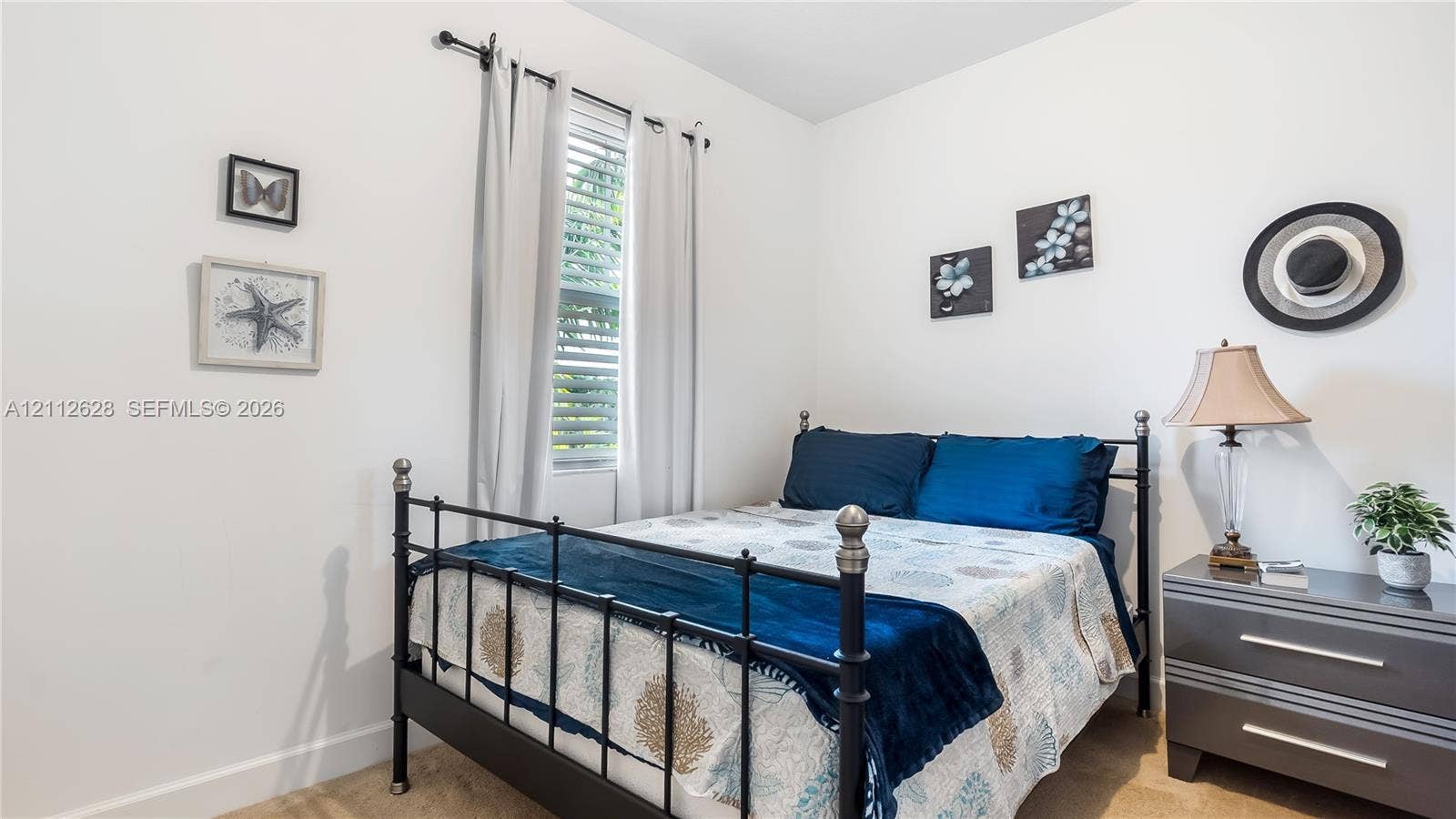 4445 NW 48th Terrace, Tamarac, Tamarac, FL 33319 This inviting guest bedroom provides soft natural light, generous wall space, and a cozy atmosphereperfect for restful nights or flexible use to suit your lifestyle.