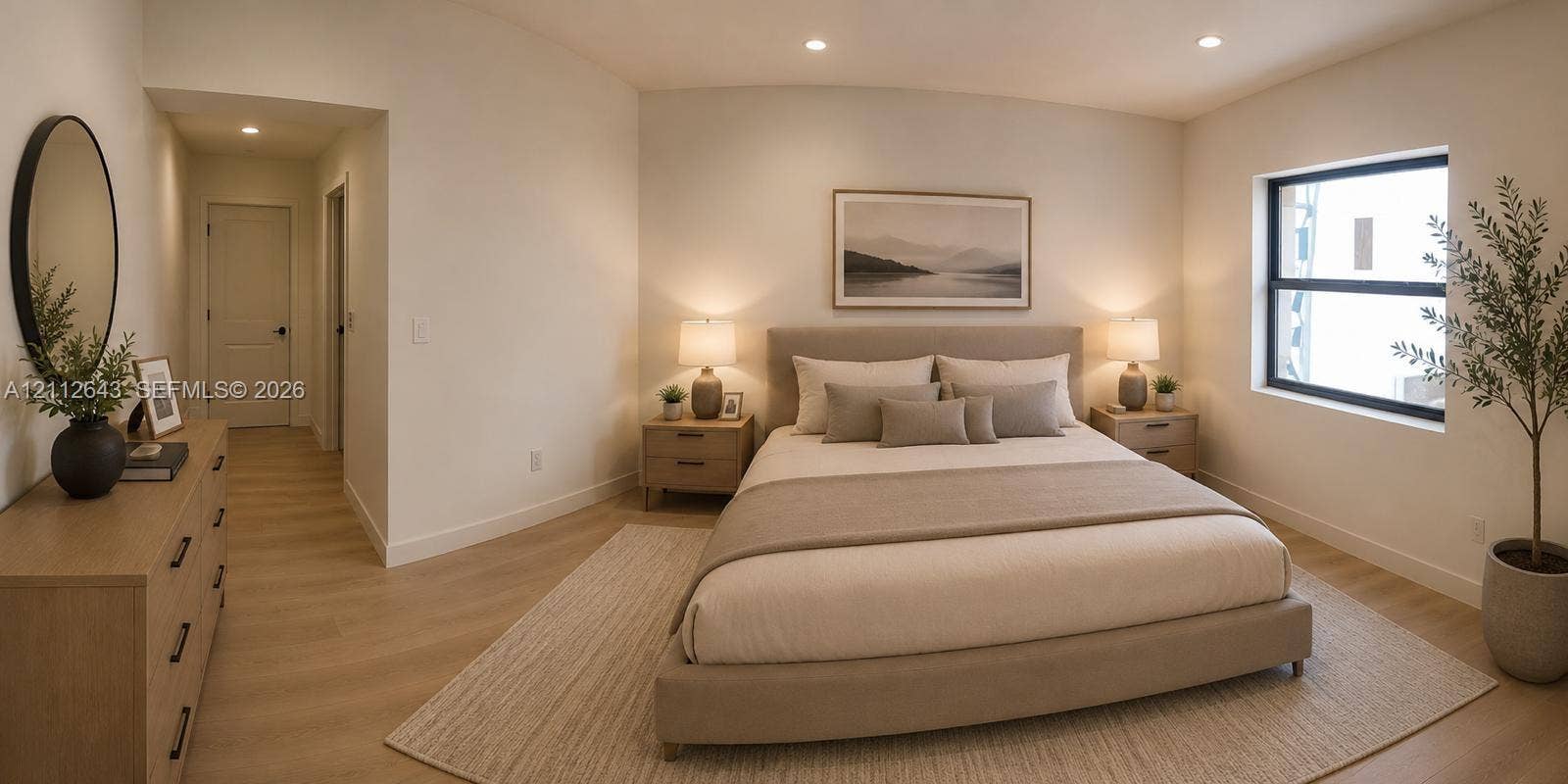 1190 NW 57th Street, Miami, FL 33127 Neutral-toned bedroom featuring wood-finish flooring, recessed lighting, and a single-pane window