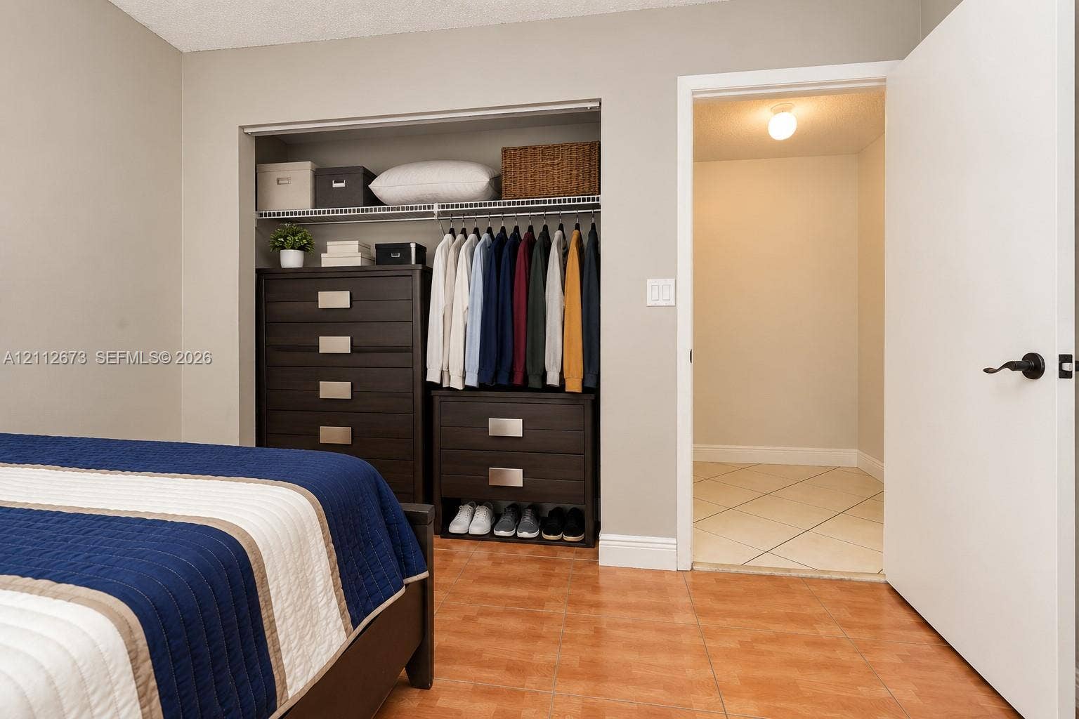 10225 SW 141st Court, #0, Miami, Miami, FL 33186 Room featuring tile flooring and a built-in closet with wire shelving