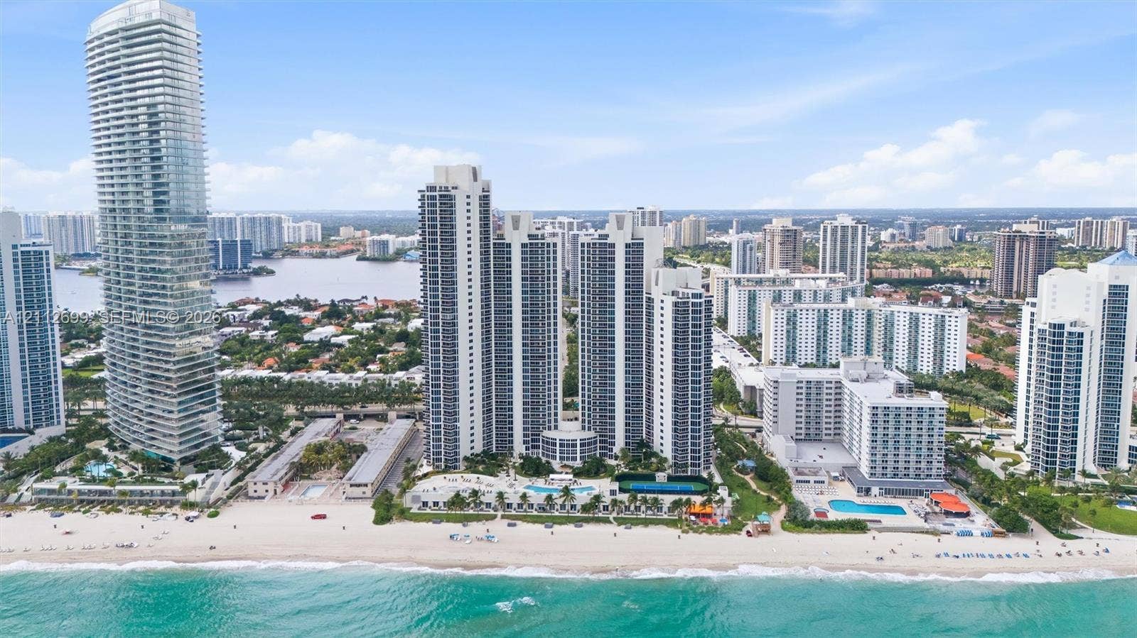 19111 Collins Avenue, #505, Sunny Isles Beach, FL 33160 High-rise coastal towers featuring direct beach access, multiple outdoor swimming pools, expansive sun decks, and proximity to inland waterways