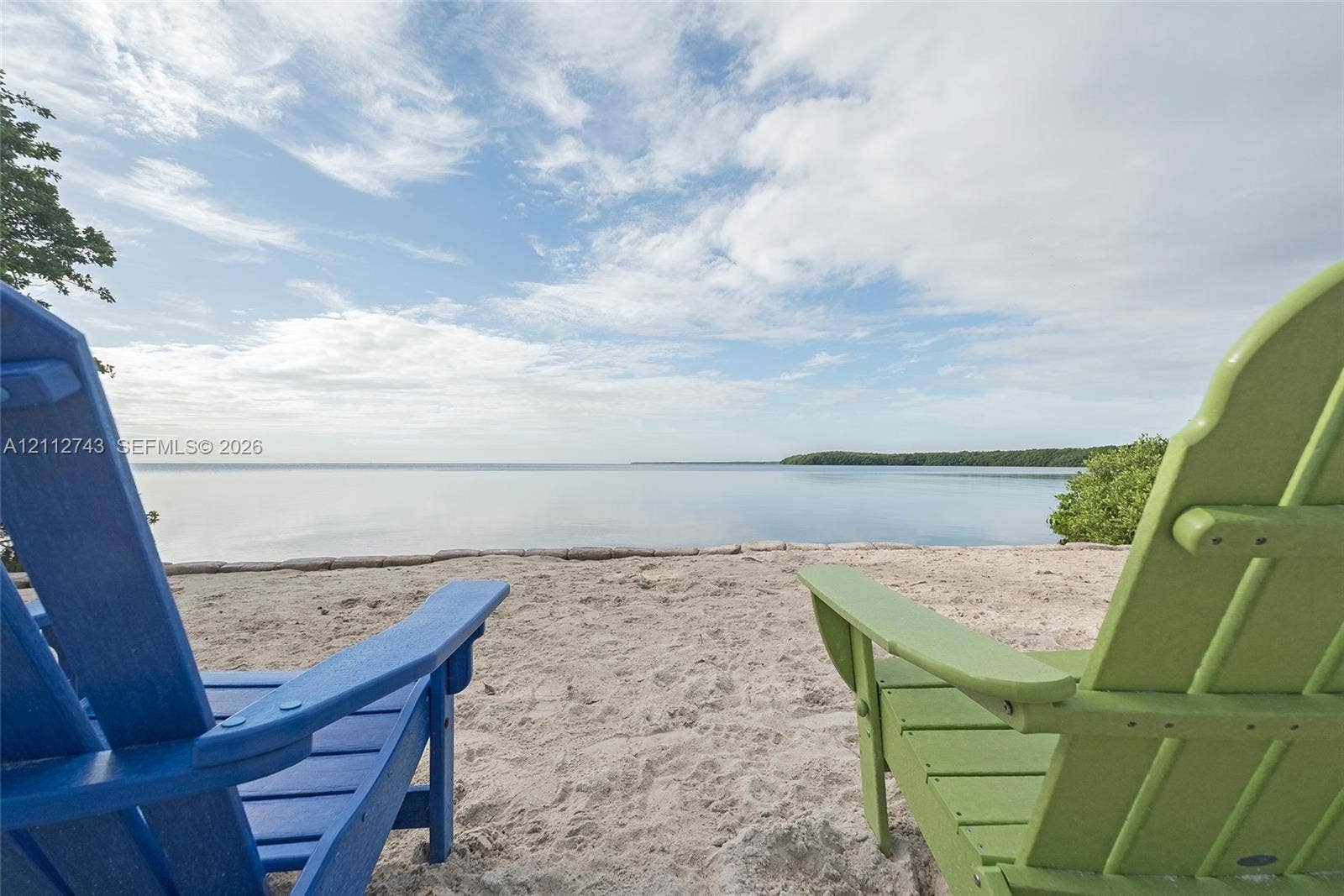 6157 Paradise Point Drive, Palmetto Bay, FL 33157 Private waterfront sand beach with mature shoreline vegetation