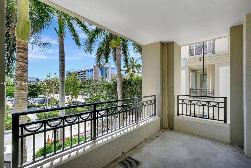 550 Okeechobee Boulevard, #224, West Palm Beach, West Palm Beach, FL 33401 Covered balcony featuring concrete flooring and decorative metal railings