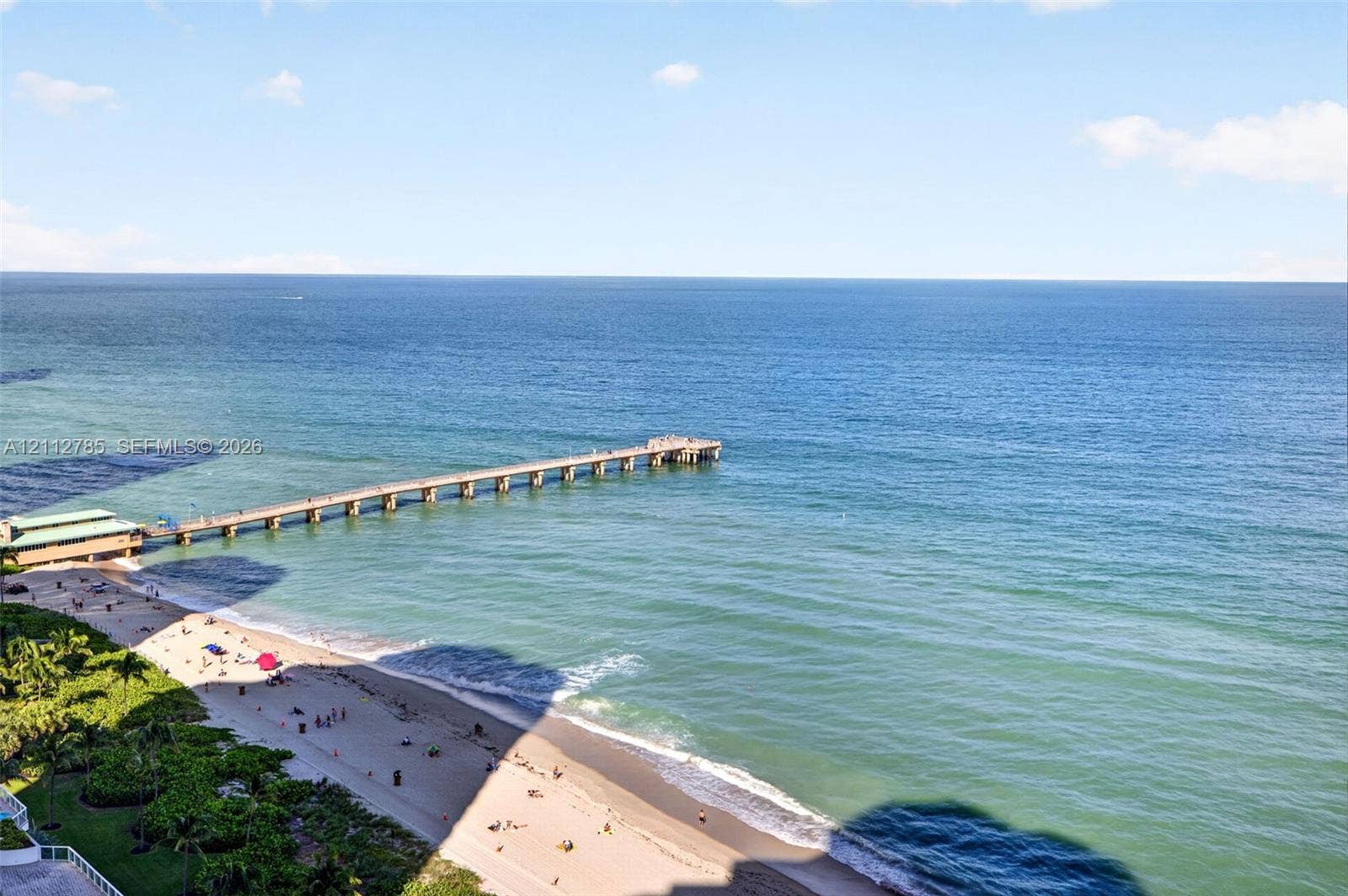16425 Collins Avenue, #2016, Sunny Isles Beach, FL 33160 Elevated coastal perspective featuring oceanfront access, a sandy shoreline, and an extended pier