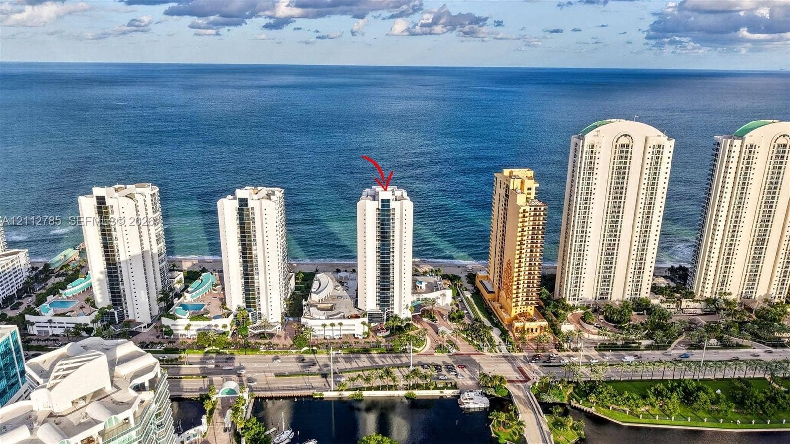 16425 Collins Avenue, #2016, Sunny Isles Beach, FL 33160 Aerial perspective of oceanfront high-rise featuring expansive water frontage and coastal positioning