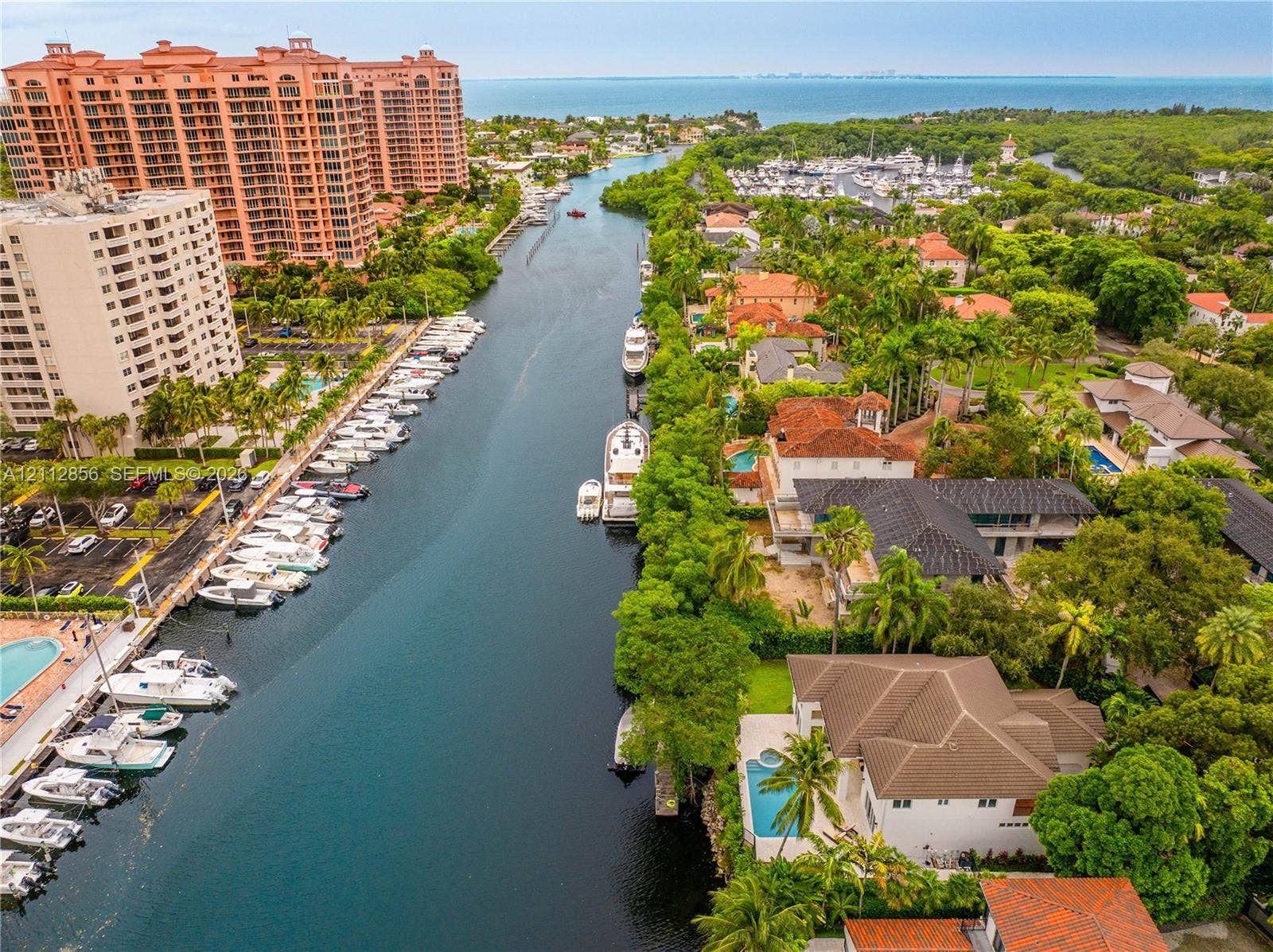 285 Las Brisas Court, Coral Gables, FL 33143 Waterfront property featuring a private swimming pool, deep-water canal access, and proximity/no bridges to open bay waters